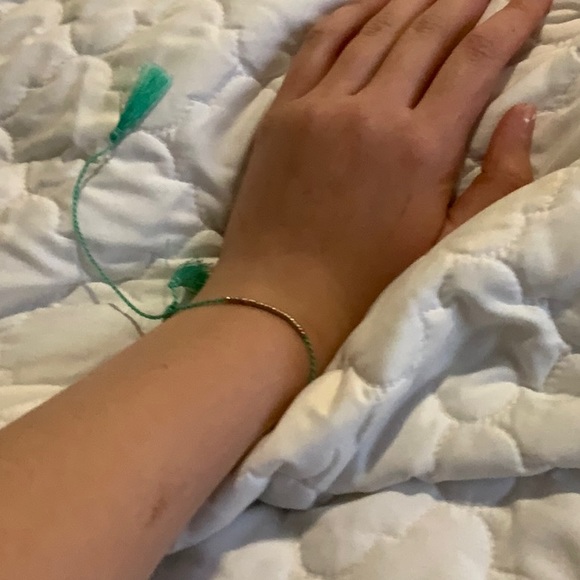 I am selling a teal and gold bracelet. - Picture 2 of 2
